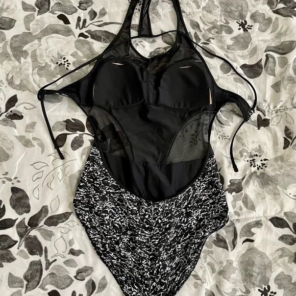 Rare LIKE NEW Lululemon cutout one piece swim suit with tie detail in back. - Picture 4 of 5